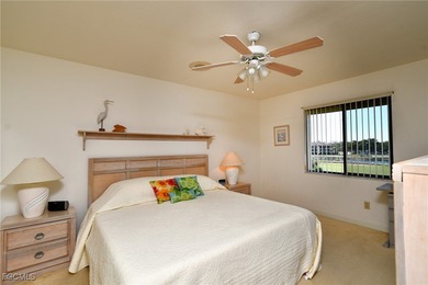 Enjoy sweeping golf and water views from this beautifully on Kelly Greens Golf and Country Club in Florida - for sale on GolfHomes.com, golf home, golf lot