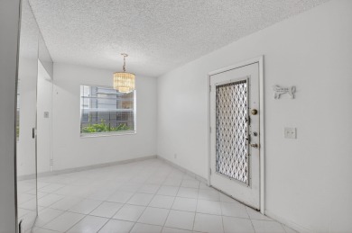 2 Bed / 2 Bath First floor unit in Kings Point Golf and Country on Kings Point Golf -Flanders Way in Florida - for sale on GolfHomes.com, golf home, golf lot