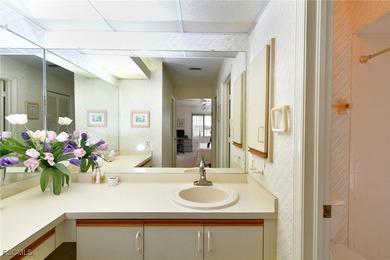 Enjoy sweeping golf and water views from this beautifully on Kelly Greens Golf and Country Club in Florida - for sale on GolfHomes.com, golf home, golf lot