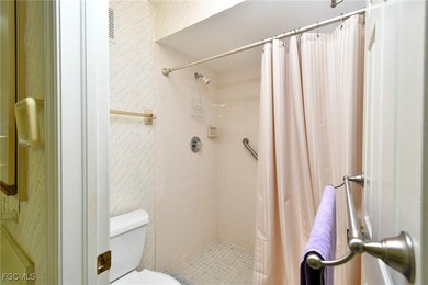 Enjoy sweeping golf and water views from this beautifully on Kelly Greens Golf and Country Club in Florida - for sale on GolfHomes.com, golf home, golf lot