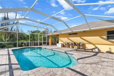 Stunning Pool Home in Bokeelia - Luxury Island Living Near on Alden Pines Golf Club in Florida - for sale on GolfHomes.com, golf home, golf lot