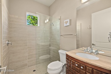 Welcome to this beautifully appointed 3-bedroom, 2-bath home on Plantation Bay Golf and Country Club in Florida - for sale on GolfHomes.com, golf home, golf lot