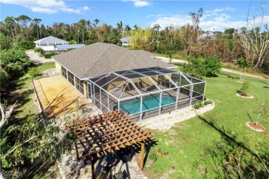 Stunning Pool Home in Bokeelia - Luxury Island Living Near on Alden Pines Golf Club in Florida - for sale on GolfHomes.com, golf home, golf lot
