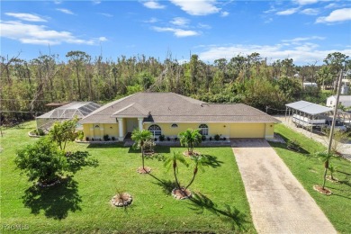 Stunning Pool Home in Bokeelia - Luxury Island Living Near on Alden Pines Golf Club in Florida - for sale on GolfHomes.com, golf home, golf lot