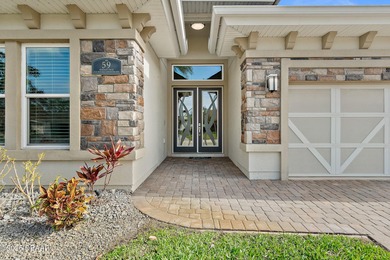 Welcome to this beautifully appointed 3-bedroom, 2-bath home on Plantation Bay Golf and Country Club in Florida - for sale on GolfHomes.com, golf home, golf lot