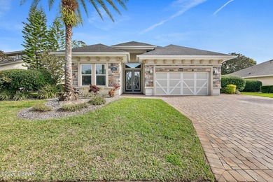 Welcome to this beautifully appointed 3-bedroom, 2-bath home on Plantation Bay Golf and Country Club in Florida - for sale on GolfHomes.com, golf home, golf lot