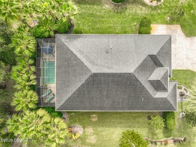 Welcome to this beautifully appointed 3-bedroom, 2-bath home on Plantation Bay Golf and Country Club in Florida - for sale on GolfHomes.com, golf home, golf lot