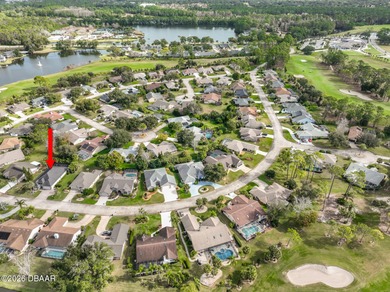 Welcome to this beautifully appointed 3-bedroom, 2-bath home on Plantation Bay Golf and Country Club in Florida - for sale on GolfHomes.com, golf home, golf lot