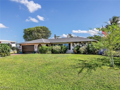 Beautiful 4-bedroom, 2-bath pool home in the highly desirable on Cypress Lake Country Club in Florida - for sale on GolfHomes.com, golf home, golf lot