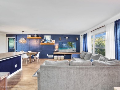 Beautiful 4-bedroom, 2-bath pool home in the highly desirable on Cypress Lake Country Club in Florida - for sale on GolfHomes.com, golf home, golf lot