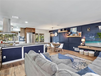 Beautiful 4-bedroom, 2-bath pool home in the highly desirable on Cypress Lake Country Club in Florida - for sale on GolfHomes.com, golf home, golf lot