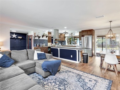 Beautiful 4-bedroom, 2-bath pool home in the highly desirable on Cypress Lake Country Club in Florida - for sale on GolfHomes.com, golf home, golf lot