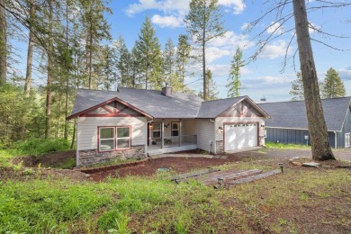Discover lakefront living at its finest on Lake San Souci! This on Stoneridge Golf Club in Idaho - for sale on GolfHomes.com, golf home, golf lot
