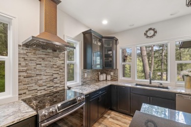Discover lakefront living at its finest on Lake San Souci! This on Stoneridge Golf Club in Idaho - for sale on GolfHomes.com, golf home, golf lot