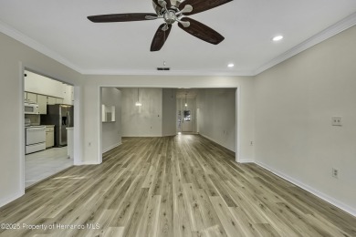 This charming villa, located on the first hole of the Grand on Timber Pines Golf Course in Florida - for sale on GolfHomes.com, golf home, golf lot
