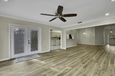 This charming villa, located on the first hole of the Grand on Timber Pines Golf Course in Florida - for sale on GolfHomes.com, golf home, golf lot