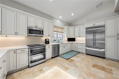 Experience unparalleled resort style living in this elegant on Sailfish Point Golf Club, Inc. in Florida - for sale on GolfHomes.com, golf home, golf lot
