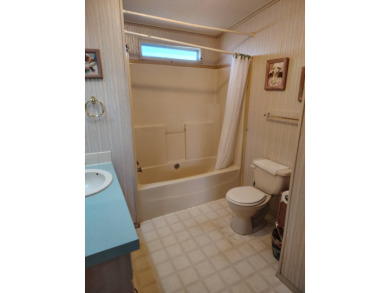 This home is priced to sell for the amount of square footage you on Spanish Lakes Fairways in Florida - for sale on GolfHomes.com, golf home, golf lot