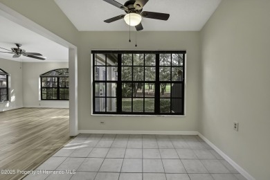 This charming villa, located on the first hole of the Grand on Timber Pines Golf Course in Florida - for sale on GolfHomes.com, golf home, golf lot