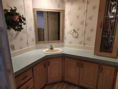 This home is priced to sell for the amount of square footage you on Spanish Lakes Fairways in Florida - for sale on GolfHomes.com, golf home, golf lot