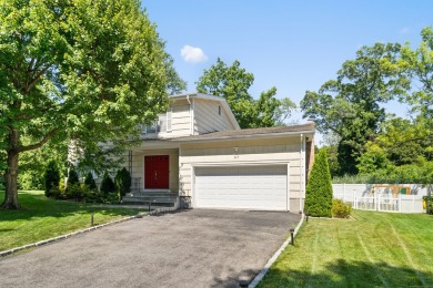 Nestled on a peaceful cul-de-sac and set on a flat quarter acre on E. Gaynor Brennan Municipal Golf Course in Connecticut - for sale on GolfHomes.com, golf home, golf lot