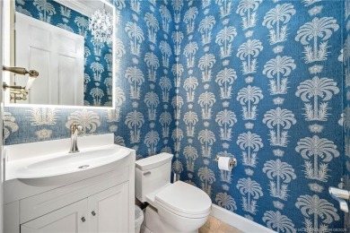 Experience unparalleled resort style living in this elegant on Sailfish Point Golf Club, Inc. in Florida - for sale on GolfHomes.com, golf home, golf lot