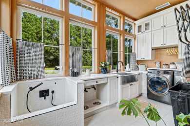 Introducing a stunning 3-bedroom, 3.5-bath estate that captures on Berkeley Hall Golf Club in South Carolina - for sale on GolfHomes.com, golf home, golf lot