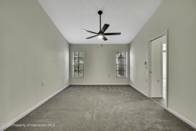 This charming villa, located on the first hole of the Grand on Timber Pines Golf Course in Florida - for sale on GolfHomes.com, golf home, golf lot