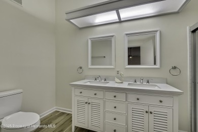 This charming villa, located on the first hole of the Grand on Timber Pines Golf Course in Florida - for sale on GolfHomes.com, golf home, golf lot