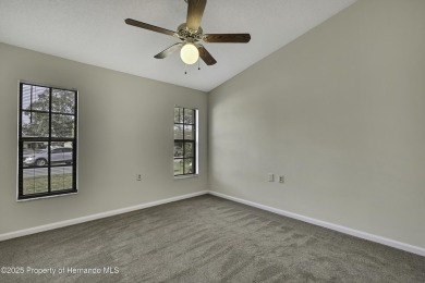 This charming villa, located on the first hole of the Grand on Timber Pines Golf Course in Florida - for sale on GolfHomes.com, golf home, golf lot