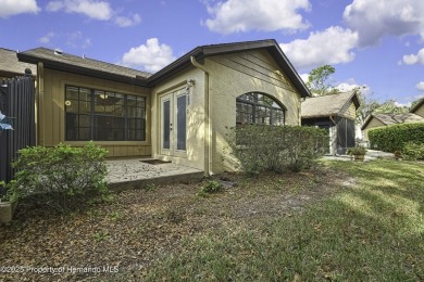 This charming villa, located on the first hole of the Grand on Timber Pines Golf Course in Florida - for sale on GolfHomes.com, golf home, golf lot