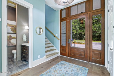 Introducing a stunning 3-bedroom, 3.5-bath estate that captures on Berkeley Hall Golf Club in South Carolina - for sale on GolfHomes.com, golf home, golf lot