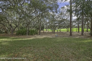 This charming villa, located on the first hole of the Grand on Timber Pines Golf Course in Florida - for sale on GolfHomes.com, golf home, golf lot