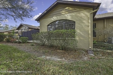 This charming villa, located on the first hole of the Grand on Timber Pines Golf Course in Florida - for sale on GolfHomes.com, golf home, golf lot