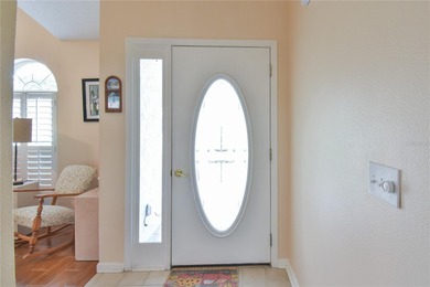 LOCATED ON A CUL-DE-SAC, this 2BD/2BA house is on a corner lot on Ocala Palms Golf and Country Club in Florida - for sale on GolfHomes.com, golf home, golf lot