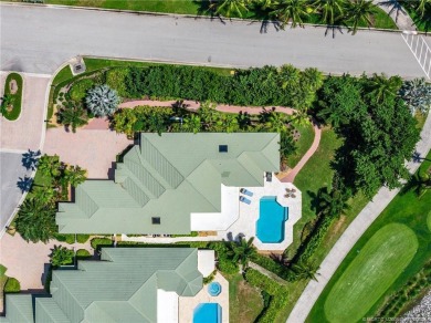 Experience unparalleled resort style living in this elegant on Sailfish Point Golf Club, Inc. in Florida - for sale on GolfHomes.com, golf home, golf lot