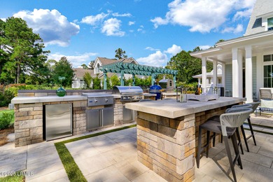 Introducing a stunning 3-bedroom, 3.5-bath estate that captures on Berkeley Hall Golf Club in South Carolina - for sale on GolfHomes.com, golf home, golf lot