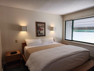 Why not just make it easy? This 2 bedroom, 2 bath condominium on Stowe Country Club in Vermont - for sale on GolfHomes.com, golf home, golf lot
