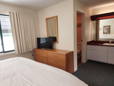 Why not just make it easy? This 2 bedroom, 2 bath condominium on Stowe Country Club in Vermont - for sale on GolfHomes.com, golf home, golf lot