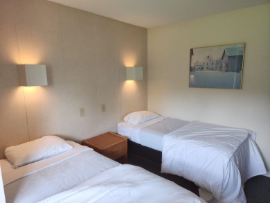 Why not just make it easy? This 2 bedroom, 2 bath condominium on Stowe Country Club in Vermont - for sale on GolfHomes.com, golf home, golf lot