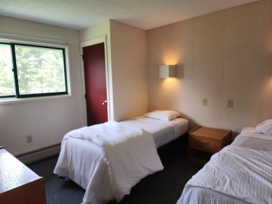 Why not just make it easy? This 2 bedroom, 2 bath condominium on Stowe Country Club in Vermont - for sale on GolfHomes.com, golf home, golf lot