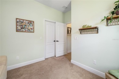 Welcome to your dream waterfront home in the highly sought-after on Palmetto Pines Golf Course in Florida - for sale on GolfHomes.com, golf home, golf lot