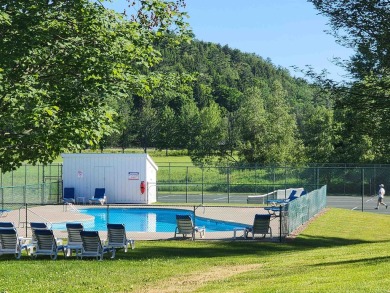 Why not just make it easy? This 2 bedroom, 2 bath condominium on Stowe Country Club in Vermont - for sale on GolfHomes.com, golf home, golf lot