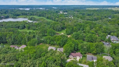This most desirable split bedroom floor plan is located on on Lake Tansi Village Country Club in Tennessee - for sale on GolfHomes.com, golf home, golf lot