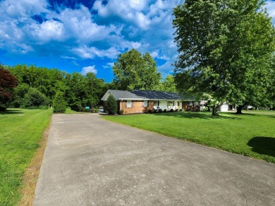 This well maintained brick ranch style home located in a on Lakeshore Country Club in Kentucky - for sale on GolfHomes.com, golf home, golf lot