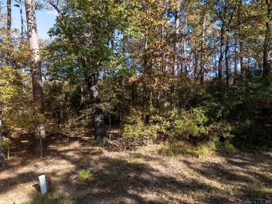 An opportunity to own a wooded, level lot in the Holly Lake on Holly Lake Ranch Golf Club in Texas - for sale on GolfHomes.com, golf home, golf lot