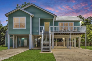 Welcome to 112 Vista Dr - Where Every Day Feels Like a Coastal on Pass Christian Isles Golf Club in Mississippi - for sale on GolfHomes.com, golf home, golf lot