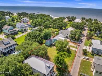 Welcome to 112 Vista Dr - Where Every Day Feels Like a Coastal on Pass Christian Isles Golf Club in Mississippi - for sale on GolfHomes.com, golf home, golf lot