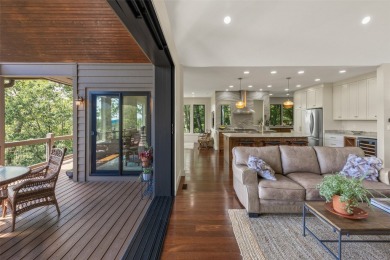 Wake up to the sun-drenched beauty of the Blue Ridge Mountains on Wildcat Cliffs Country Club in North Carolina - for sale on GolfHomes.com, golf home, golf lot