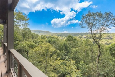 Wake up to the sun-drenched beauty of the Blue Ridge Mountains on Wildcat Cliffs Country Club in North Carolina - for sale on GolfHomes.com, golf home, golf lot